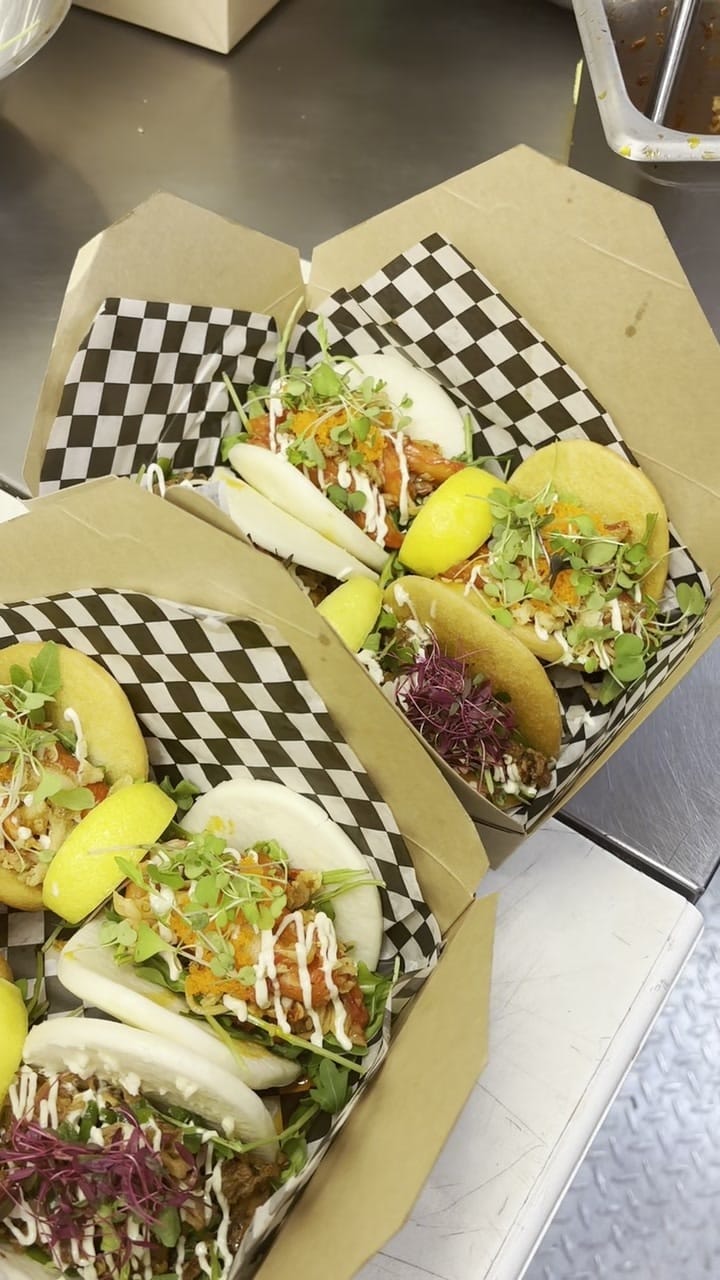 A Shaka's kraft box packed with finished bao buns